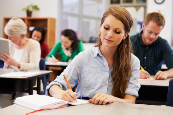 Young,Woman,Studying,At,An,Adult,Education,Class